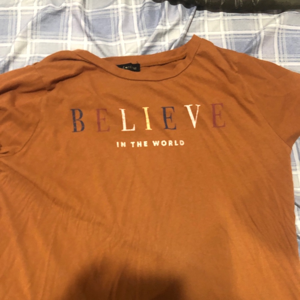 Brown T-shirt, Believe In The World Text